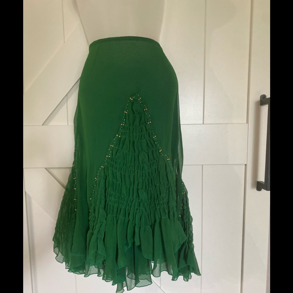 NWOT whimsical green pleated and beaded skirt.